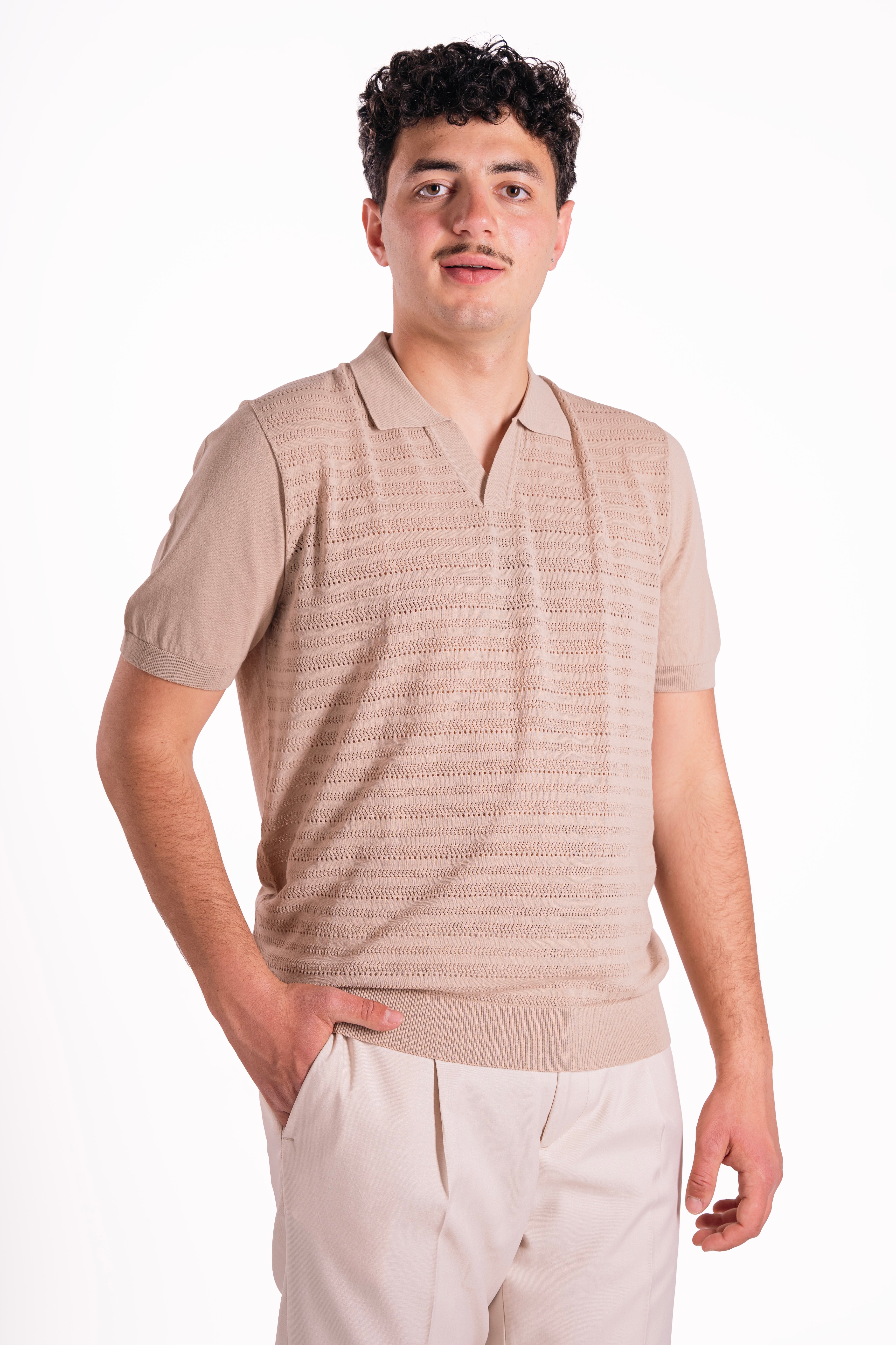 Polo traforata in 100% cotone