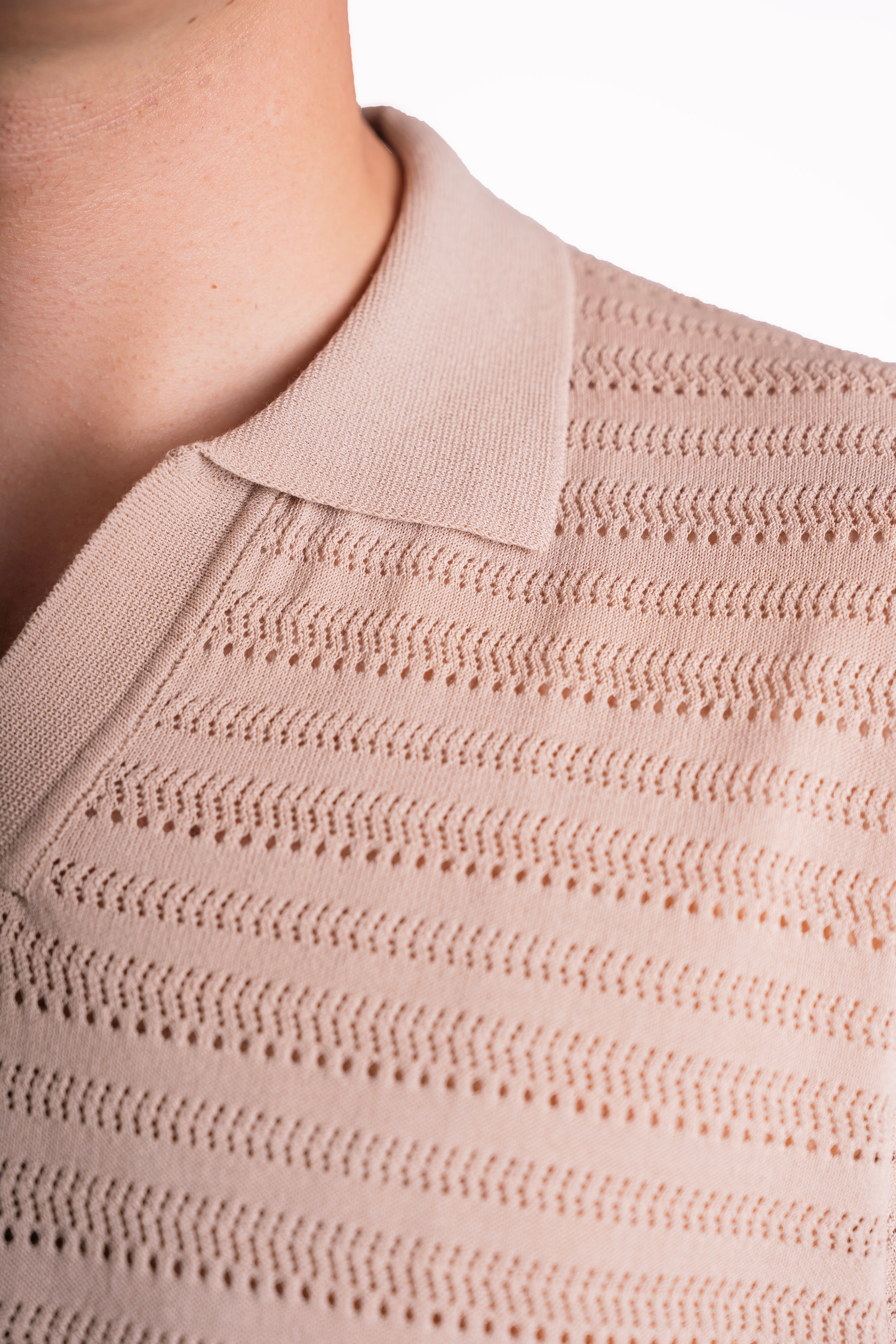 Polo traforata in 100% cotone