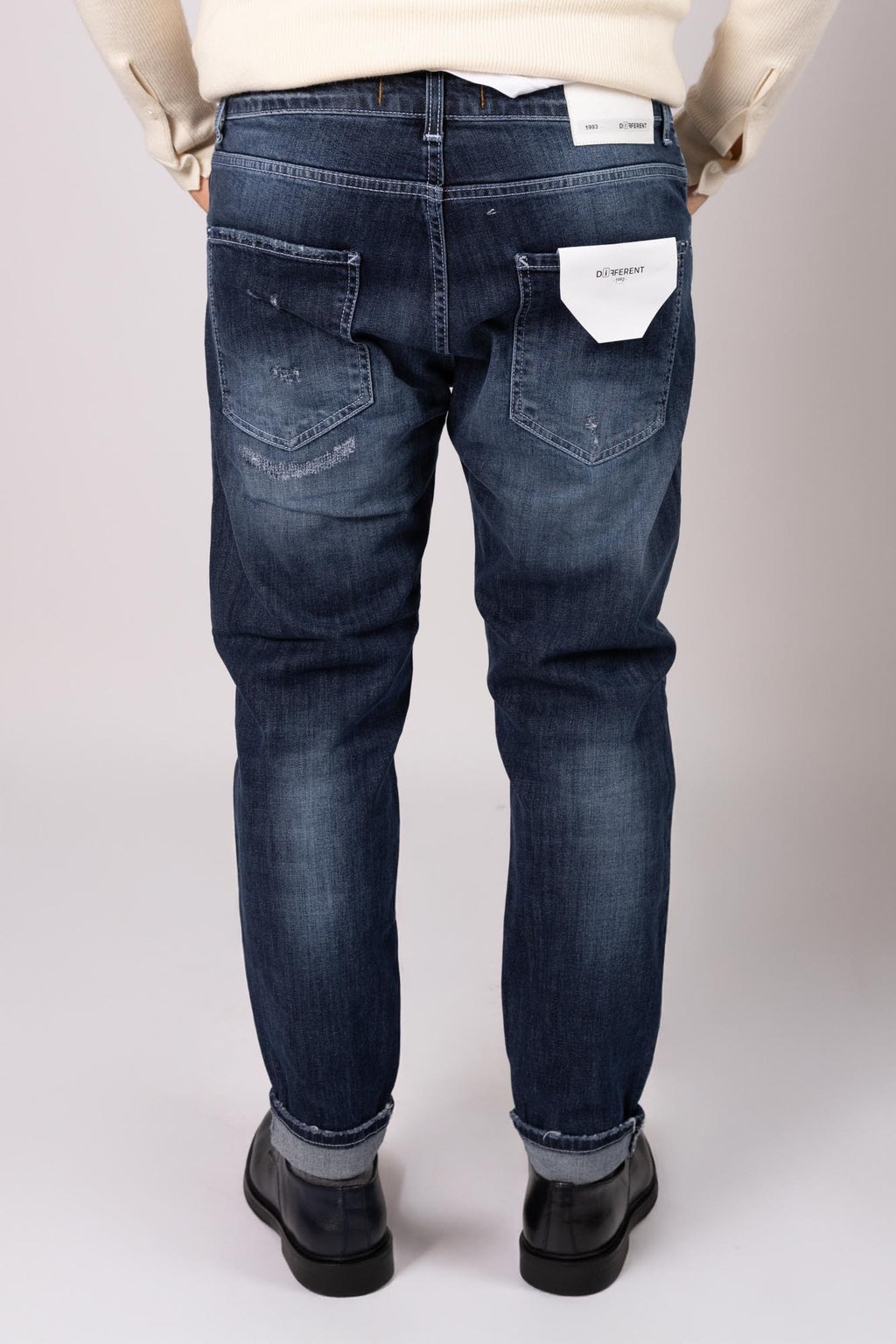 Jeans Different fondo blu