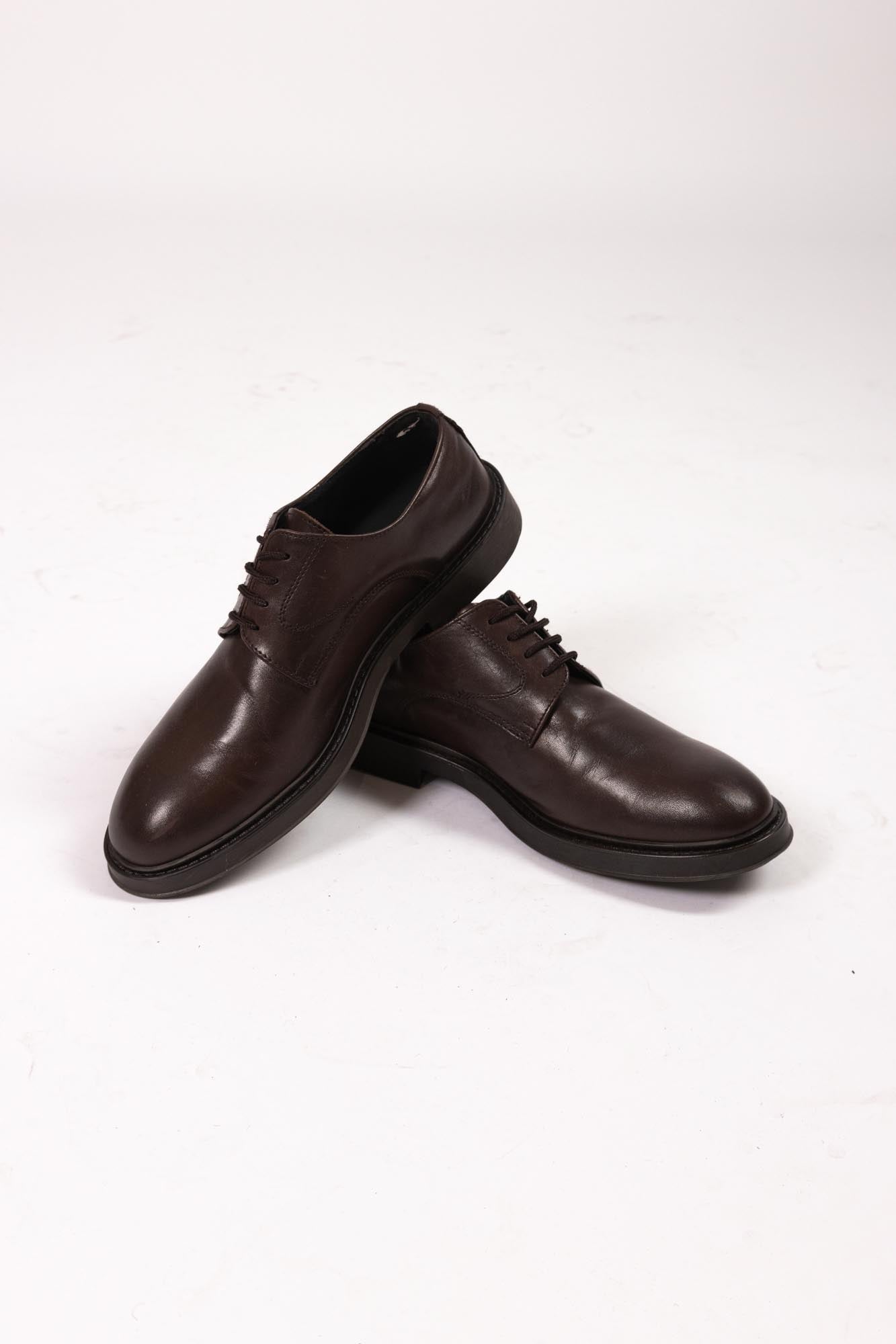 Stringata marrone in pelle